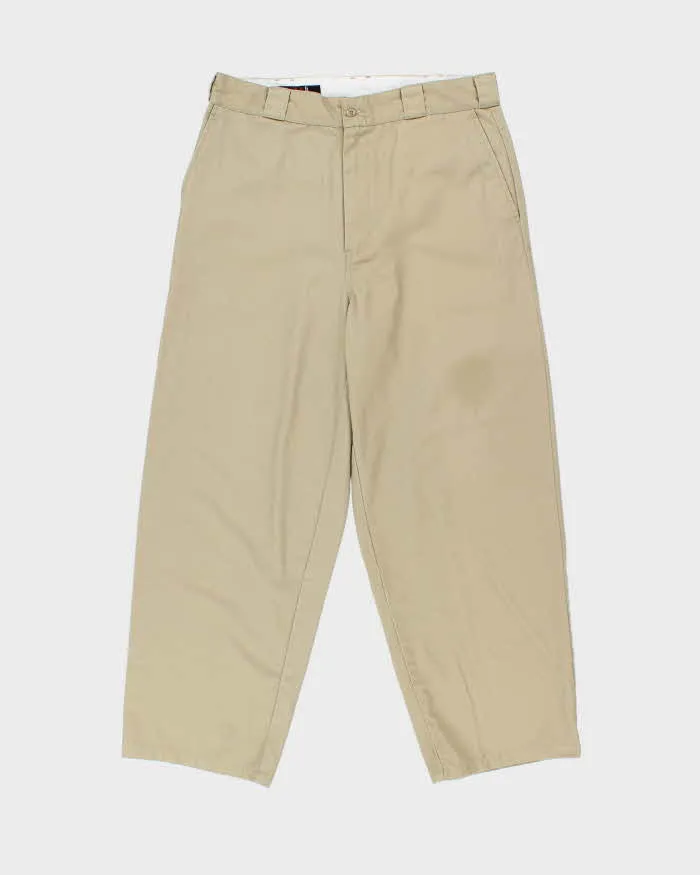 Vintage 1990s Vans Khaki Canvas High-Rise Relaxed Fit Wide Leg Baggy Skater Chinos - W34 L28 sold by Rokit