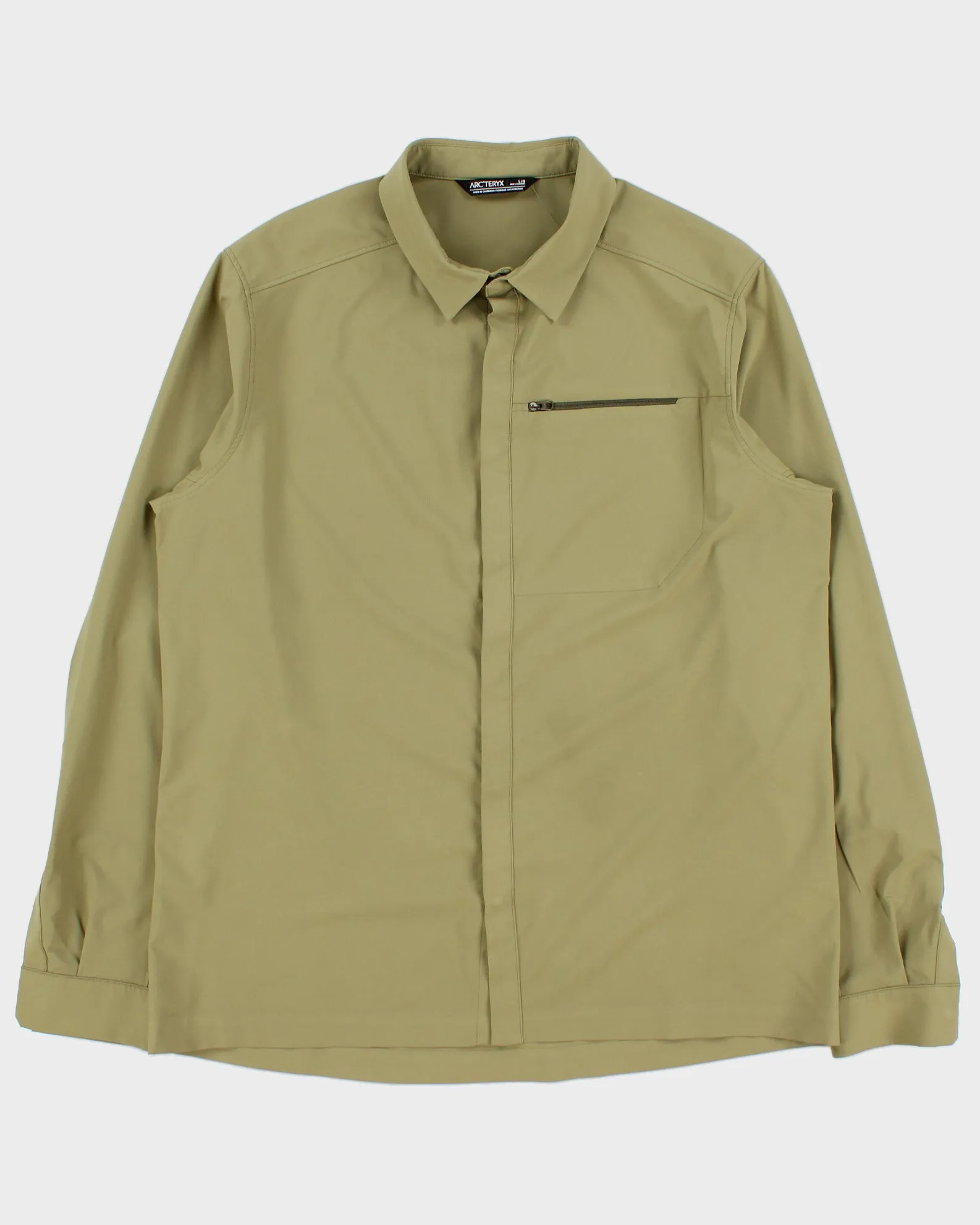 Vintage Arc'teryx Skyline Snap Button Long Sleeve Shirt - L sold by Rokit