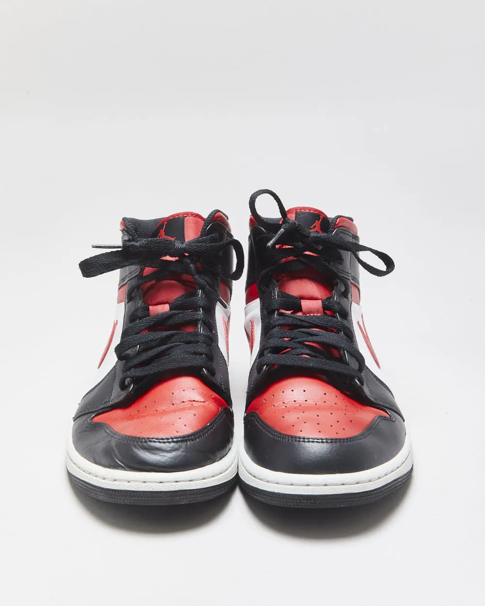 2022 Nike Air Jordan 1 Mid 'Bred Toe' Black/Fire Red/White Trainers - UK10 sold by Rokit product image thumbnail 3