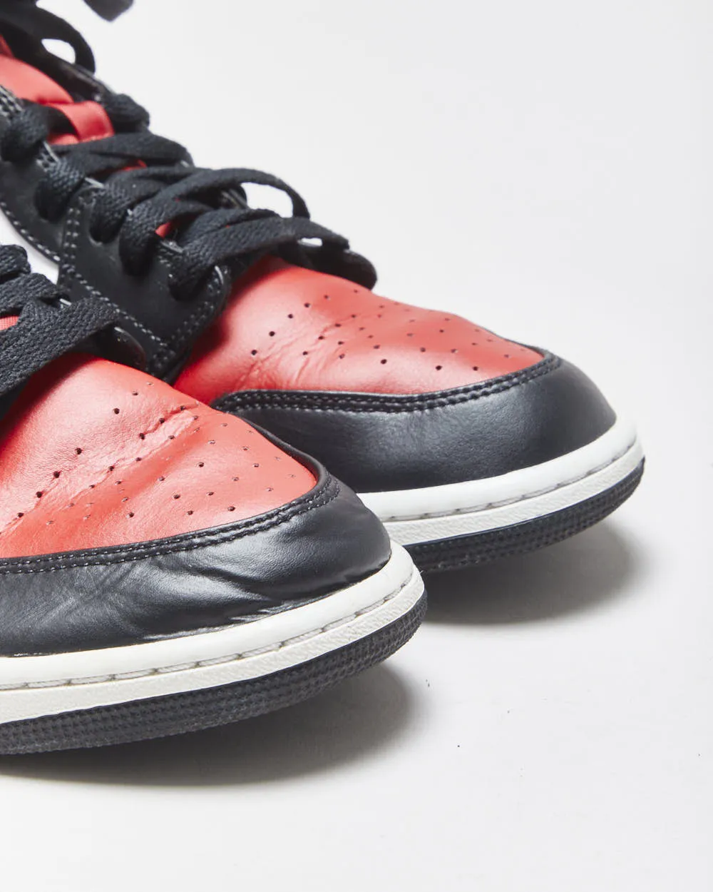 2022 Nike Air Jordan 1 Mid 'Bred Toe' Black/Fire Red/White Trainers - UK10 sold by Rokit product image thumbnail 5