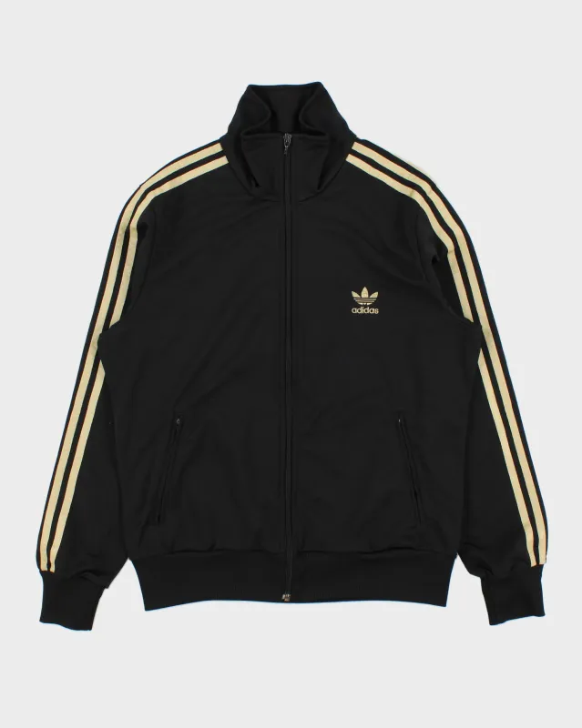 Vintage Y2K 00s Adidas Originals Women's Black & Gold Firebird Track Jacket - XL made by Adidas