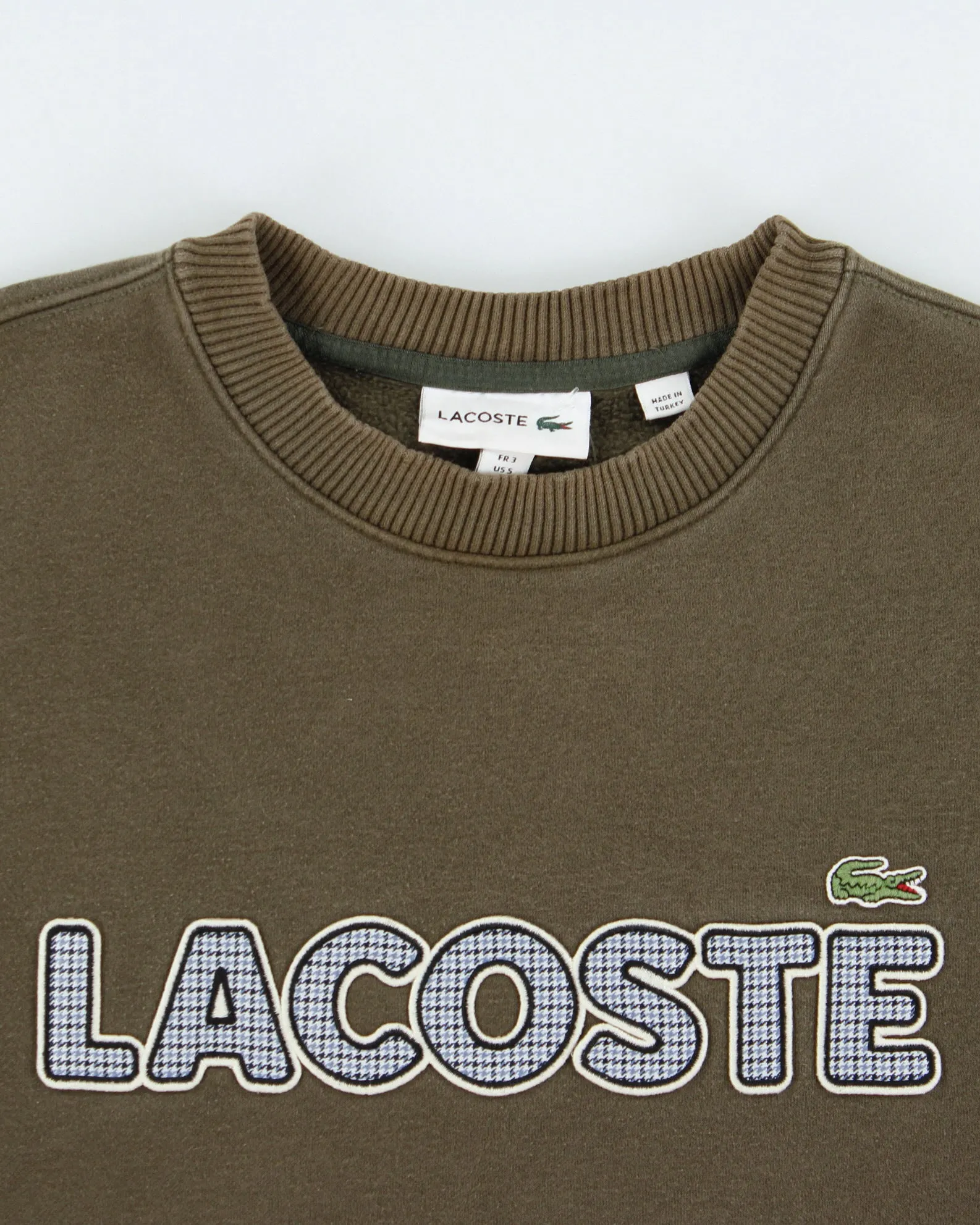 Vintage Lacoste Khaki Embroidered Houndstooth Spell Out Heavyweight Crewneck Sweatshirt - S sold by Rokit product image thumbnail 5