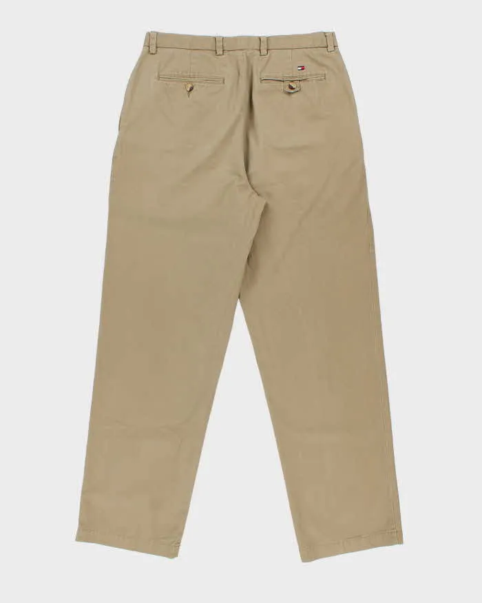 Vintage Y2K 00s Tommy Hilfiger Khaki Double Pleated Relaxed Fit Wide Leg Chino Trousers - W34 L33 sold by Rokit product image thumbnail 2