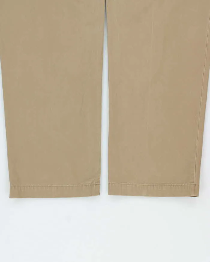 Vintage Y2K 00s Tommy Hilfiger Khaki Double Pleated Relaxed Fit Wide Leg Chino Trousers - W34 L33 sold by Rokit product image thumbnail 5