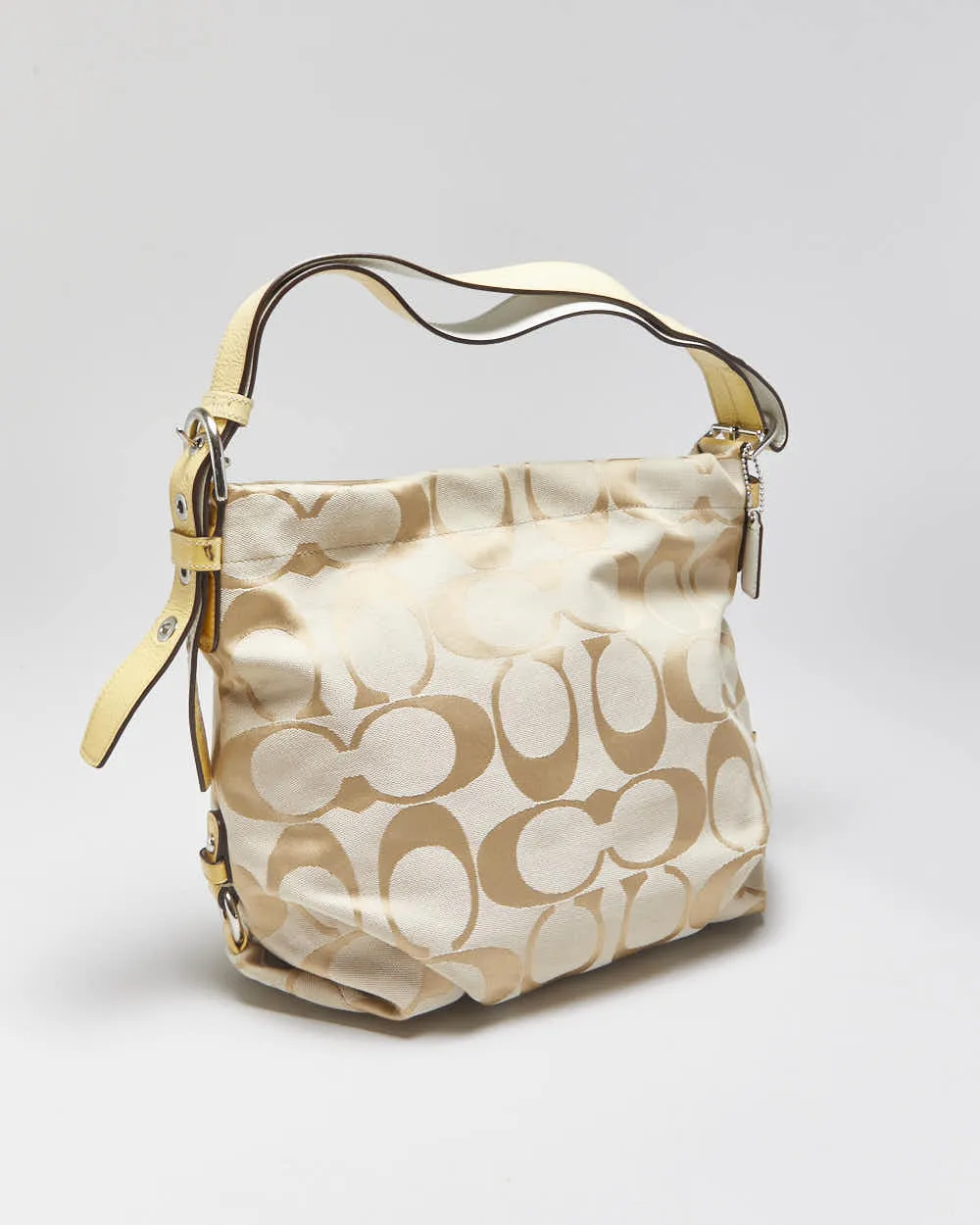 Vintage Y2k 2000s Coach Signature Carly Hobo Handbag sold by Rokit
