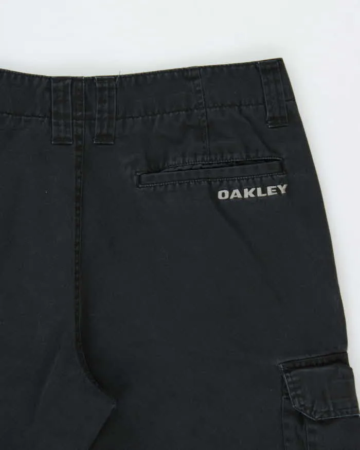 Vintage Oakley Canvas Relaxed Fit Straight Leg Cargo Trousers - W32 L31 sold by Rokit product image thumbnail 4