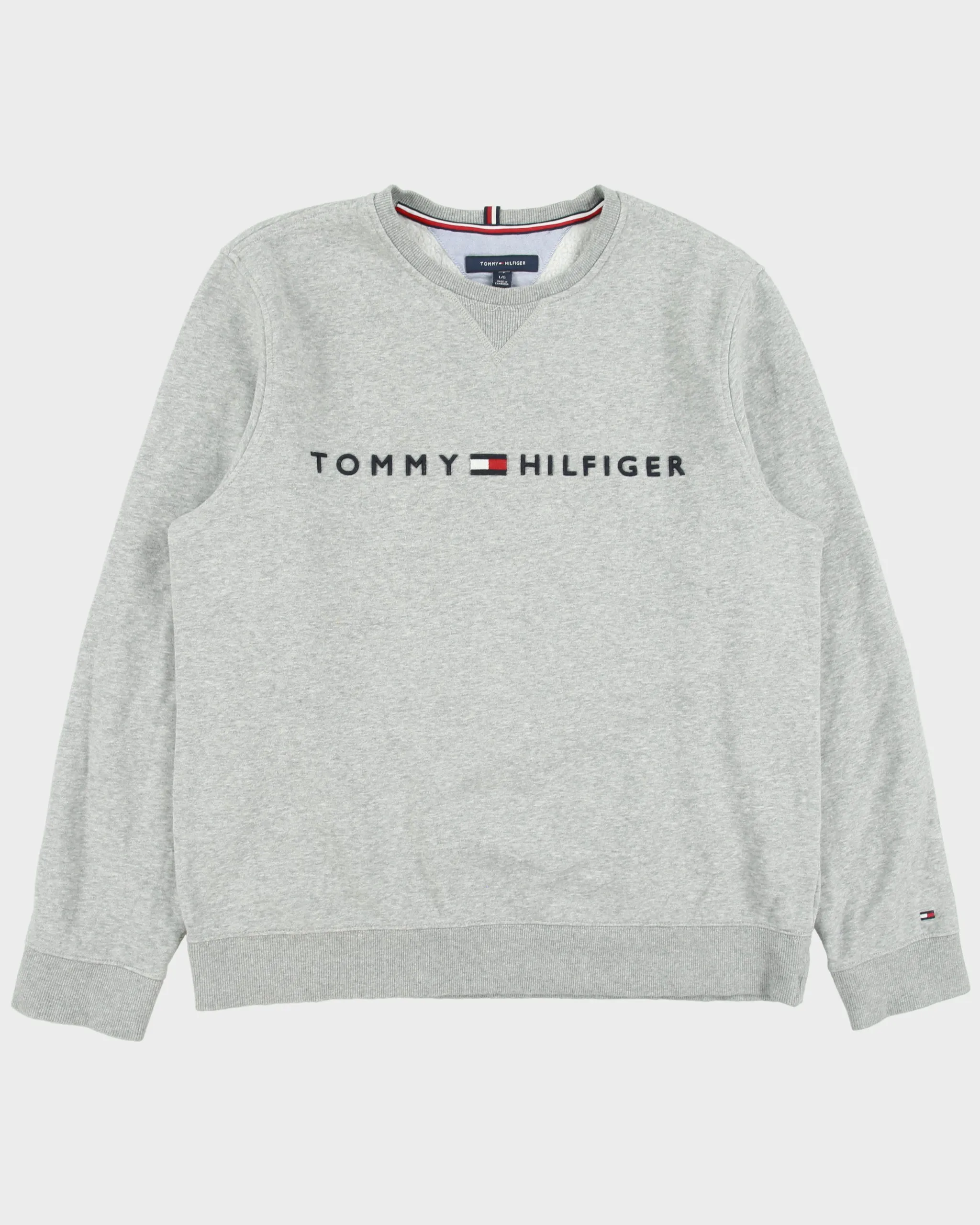 Vintage Tommy Hilfiger Grey Marl Embroidered Spell Out Fleece Lined Crewneck Sweatshirt - L sold by Rokit