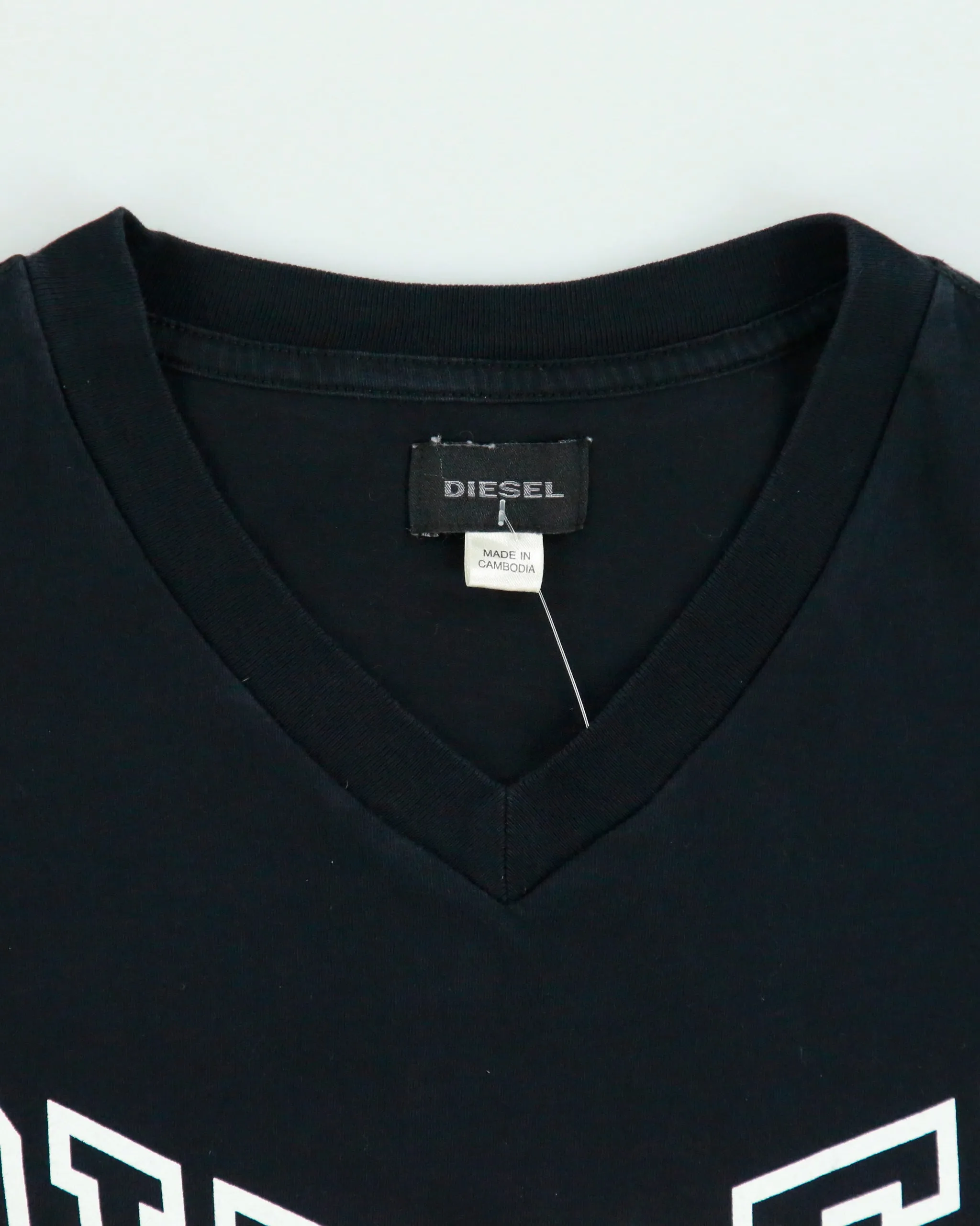 Vintage Diesel Star Spell Out Fitted V-Neck Logo T-Shirt - XL sold by Rokit product image thumbnail 5