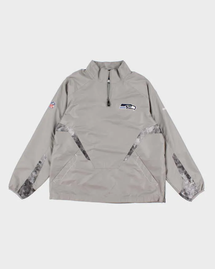Vintage Men's NFL Sea Hawkes X Reebok Grey Track Jacket - L sold by Rokit