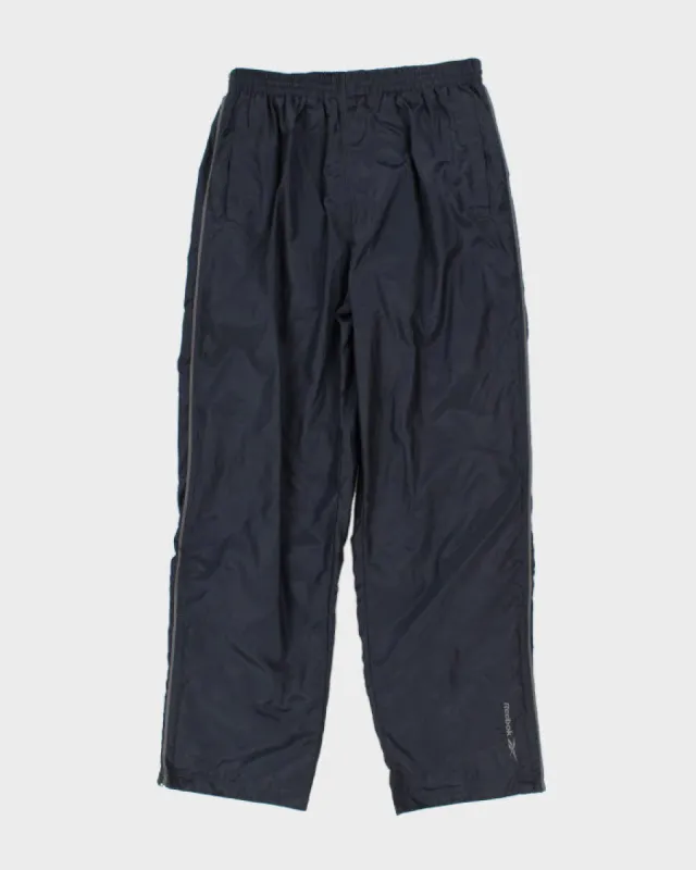 Vintage 90s/00s Reebok Navy Track Bottoms - L sold by Rokit