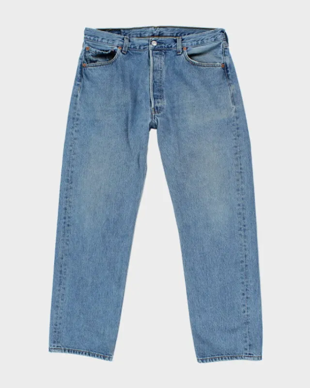 Vintage Levi's 501 Medium Wash Jeans - W34 L30 sold by Rokit