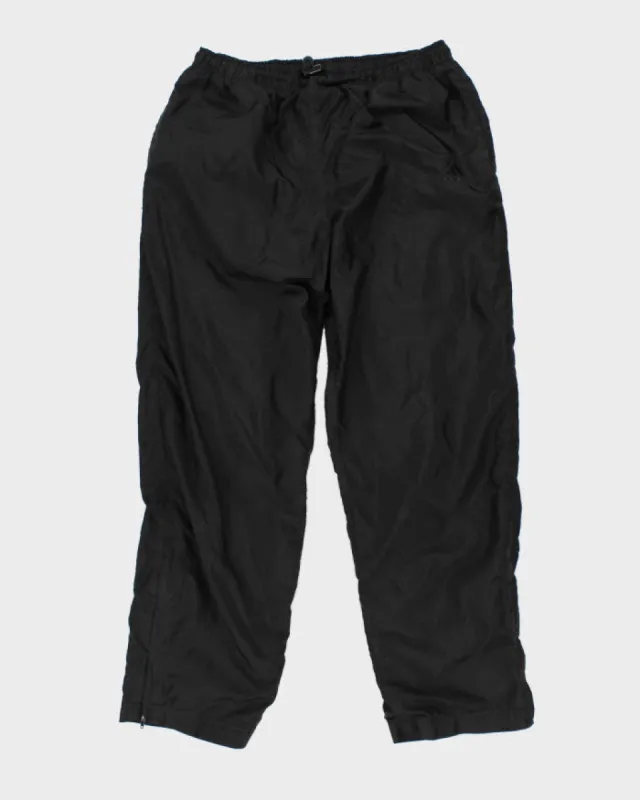 Vintage 90s Adidas Boys Black Track Bottoms - L sold by Rokit