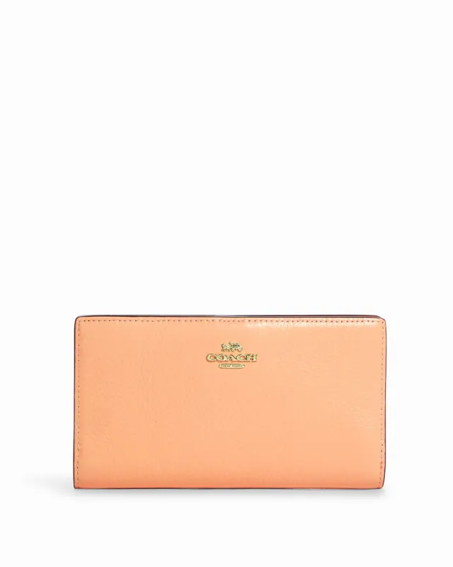 Coach Slim Zip Wallet sold by Ruumur