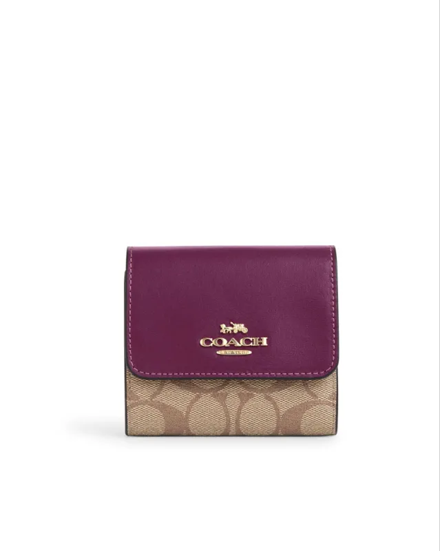 Coach Small Trifold Wallet In Blocked Signature Canvas sold by Ruumur