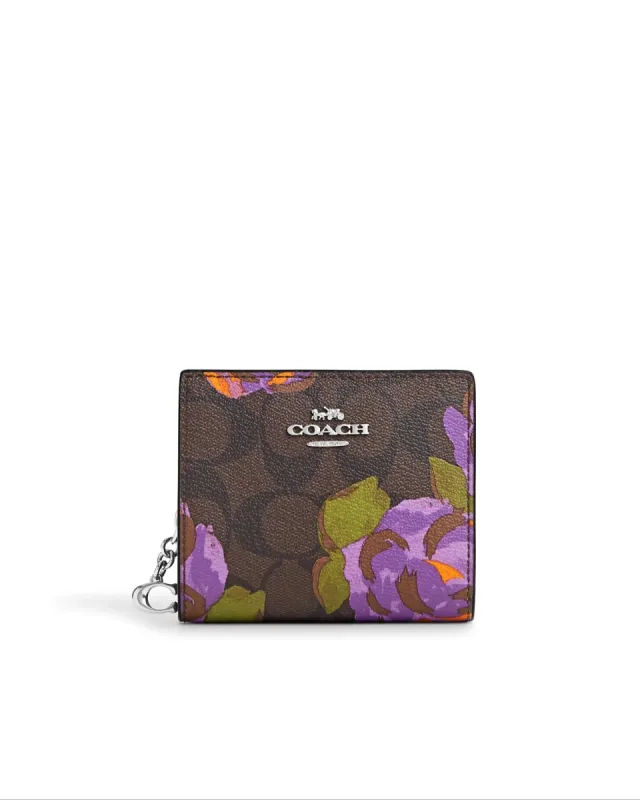 Coach Snap Wallet In Signature Canvas With Rose Print sold by Ruumur