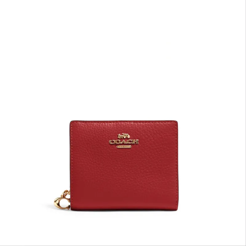 Coach Snap Wallet sold by Ruumur