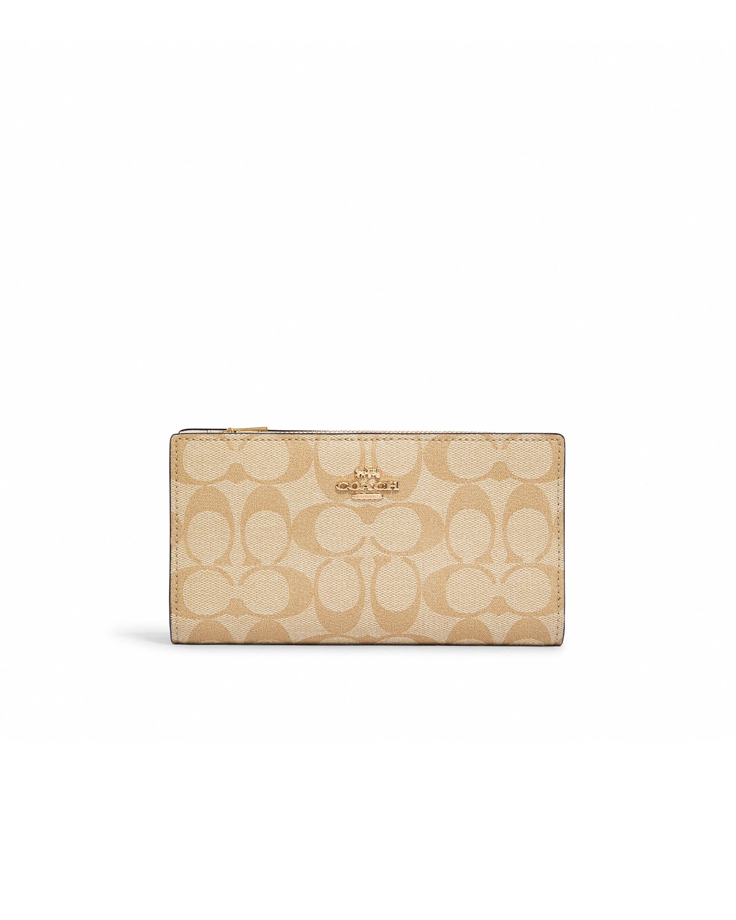 Coach Women's Slim Zip Wallet In Signature Canvas sold by Ruumur