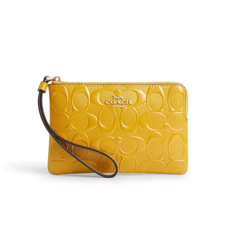 Coach Women's Corner Zip In Signature Leather sold by Ruumur