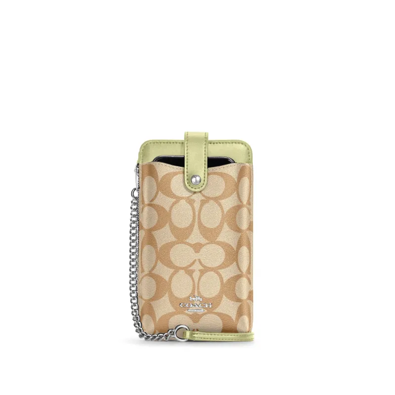 Coach Women's North/South Phone Crossbody In Signature Canvas sold by Ruumur