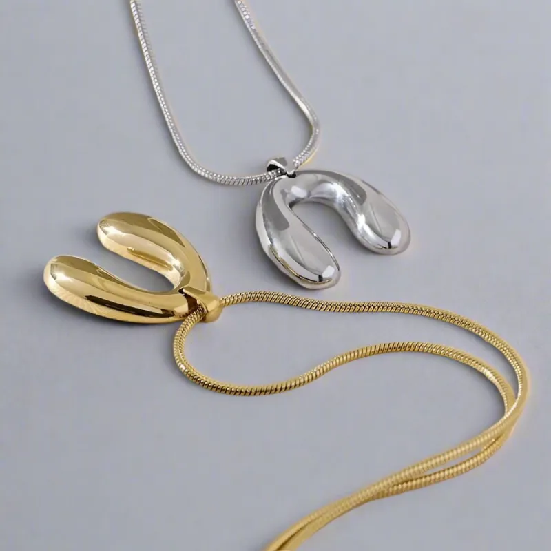Modern Wishbone Pendant Necklace sold by Ruumur