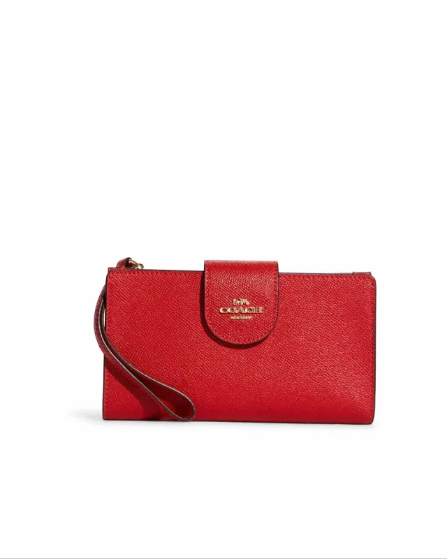 Coach Phone Wallet sold by Ruumur