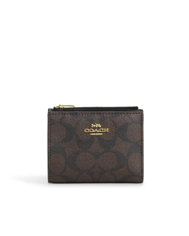 Coach Bifold Wallet In Signature Canvas sold by Ruumur