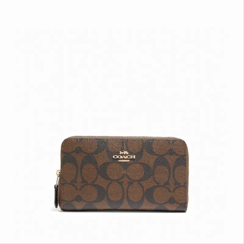 Coach Women's Brown & Black Medium Id Zip Wallet In Signature Canvas sold by Ruumur