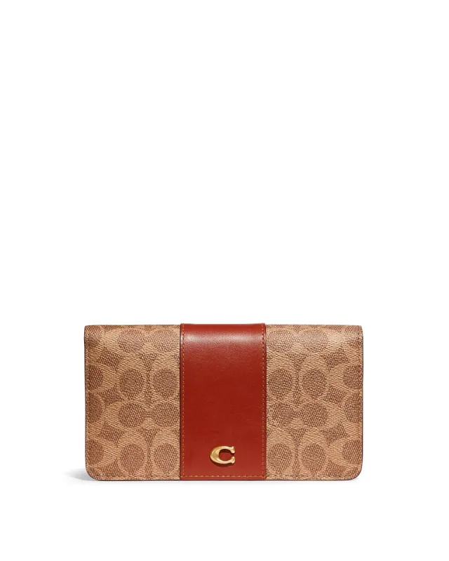 Coach Women's Tan & Rust Slim Wallet In Signature Canvas sold by Ruumur
