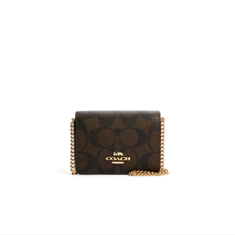 Coach Mini Wallet On A Chain In Signature Canvas sold by Ruumur