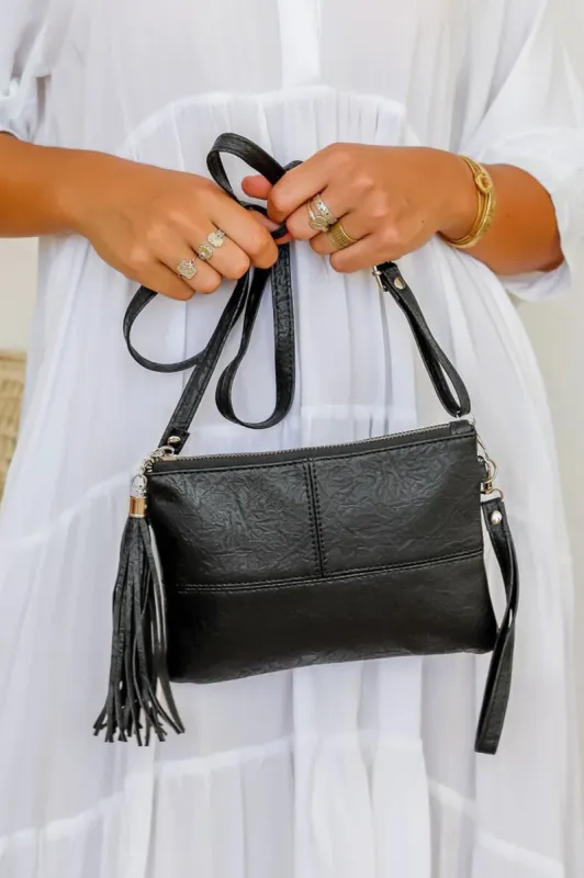 Churro Clutch - Soft Touch Clutch with Wristlet and Strap in Black sold by Salty Crush