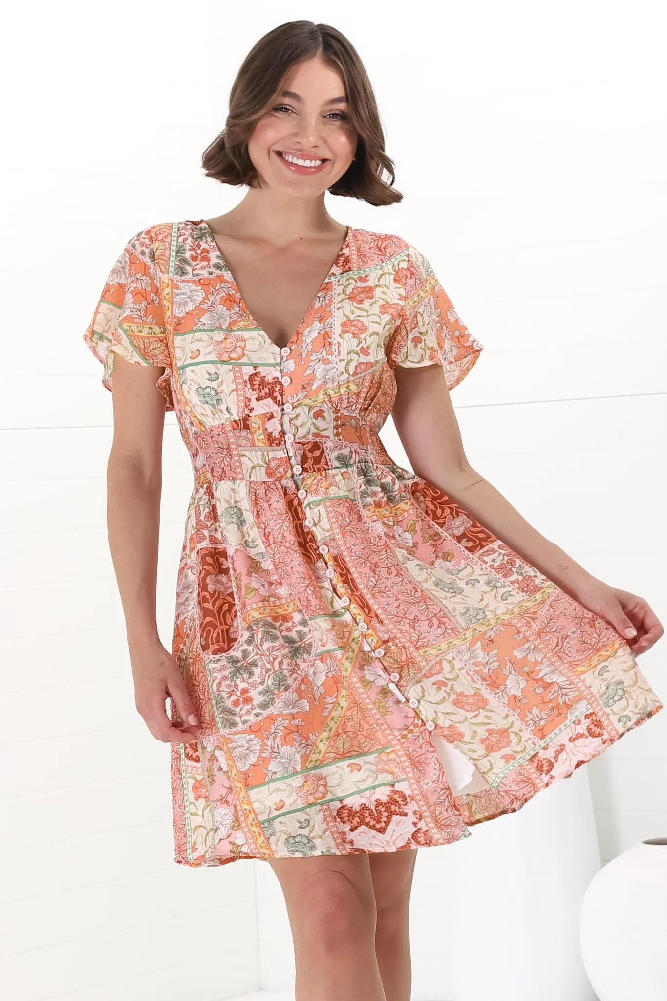 Aurelia Mini Dress - Button-Down Flutter Sleeve Dress in Anslee Print Orange sold by Salty Crush