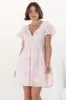 Achanti Mini Dress - Cotton Lace Overlay Cap Sleeve Smock Dress in Pink sold by Salty Crush