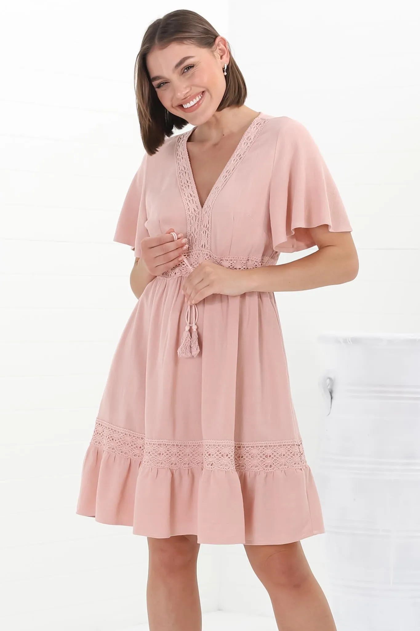 Kimmy Mini Dress - Lace Detailed Cape Sleeve Dress with Pull Tie Waist in Blush sold by Salty Crush product image thumbnail 2