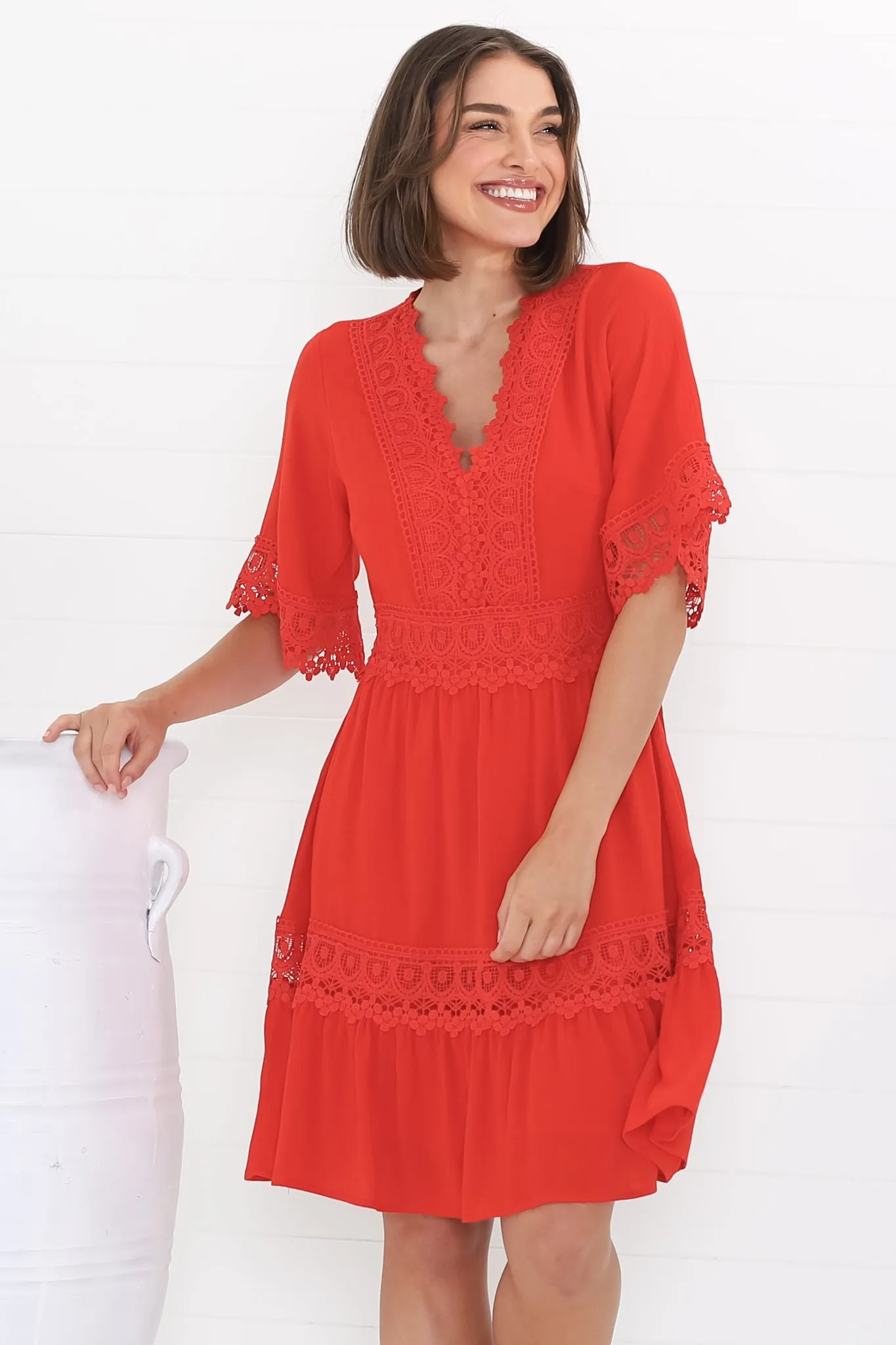 Leelie Mini Dress - Lace Embellished Tiered Dress with Bell Sleeves in Red sold by Salty Crush product image thumbnail 3