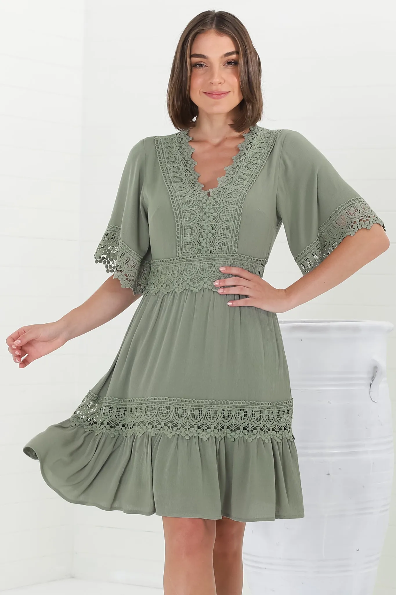 Leelie Mini Dress - Lace Embellished Tiered Dress with Bell Sleeves in Green sold by Salty Crush product image thumbnail 5
