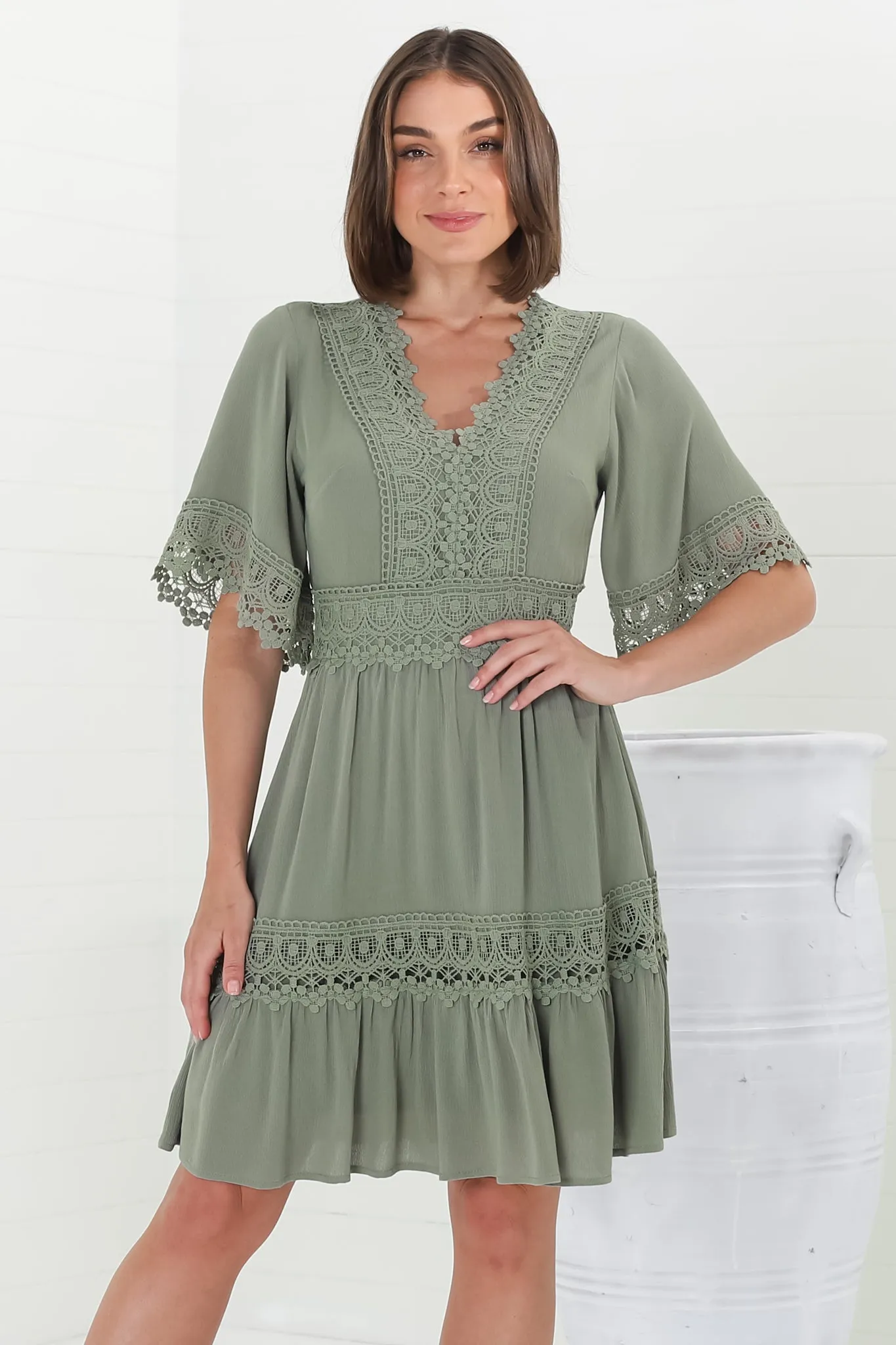 Leelie Mini Dress - Lace Embellished Tiered Dress with Bell Sleeves in Green sold by Salty Crush