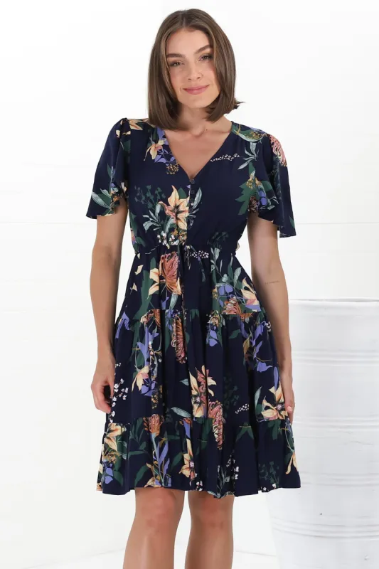 Elle Mini Dress - Buttoned Bodice A-Line Dress with Flute Sleeves in Raven Print Navy sold by Salty Crush
