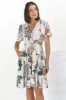 Elle Mini Dress - Buttoned Bodice A-Line Dress with Flute Sleeves in Raven Print White sold by Salty Crush
