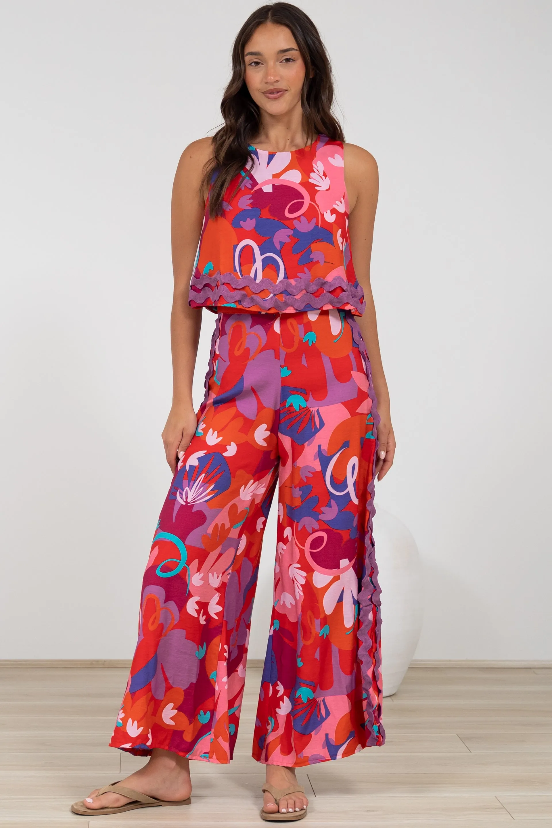 Luchia Jumpsuit - Sleeveless Overlay Bodice Jumpsuit with Ric Rac Trims in Talina Print sold by Salty Crush