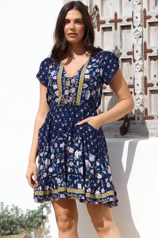 Lizzie Mini Dress - Butterfly Cap Sleeve Button Down Dress with Pockets in Wild Indigo Print sold by Salty Crush