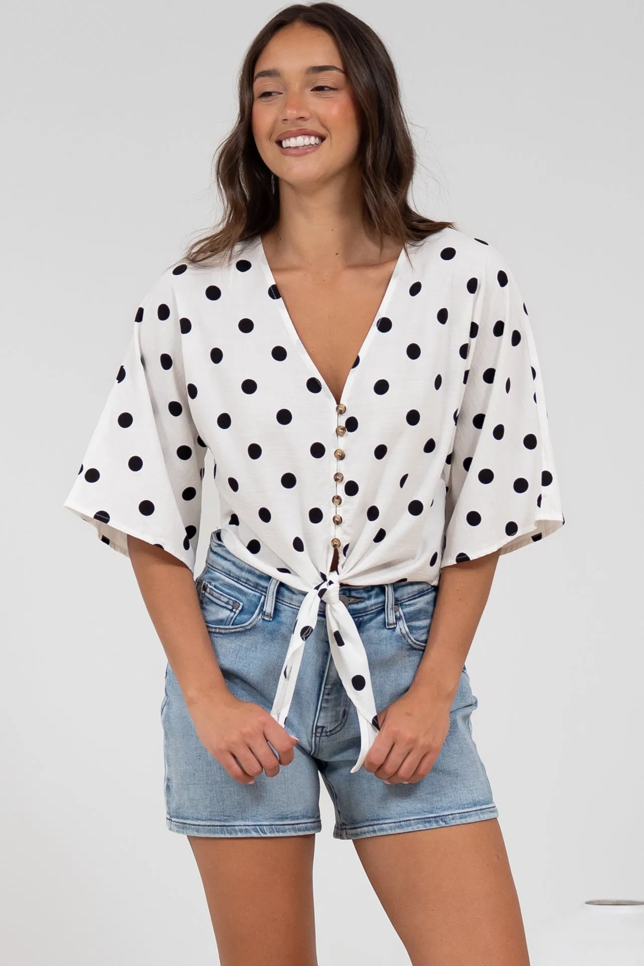 Waverly Top - V-Neck Button Down Top with Tie at Waist in Black Polka Dot Print sold by Salty Crush product image thumbnail 3