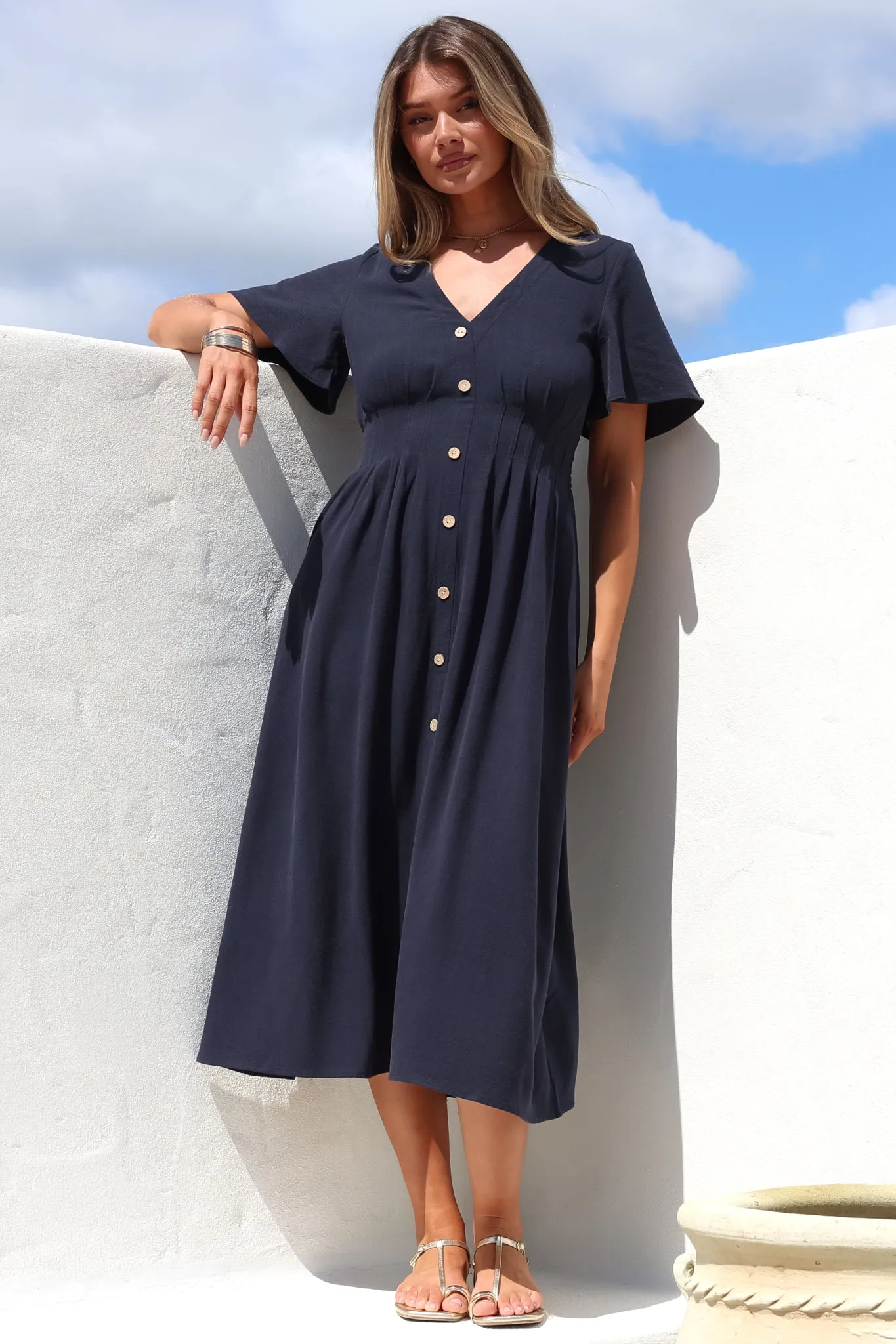 Stellar Midi Dress - Flutter Sleeve A-Line Dress with Pin Tuck Waist Detail in Navy sold by Salty Crush