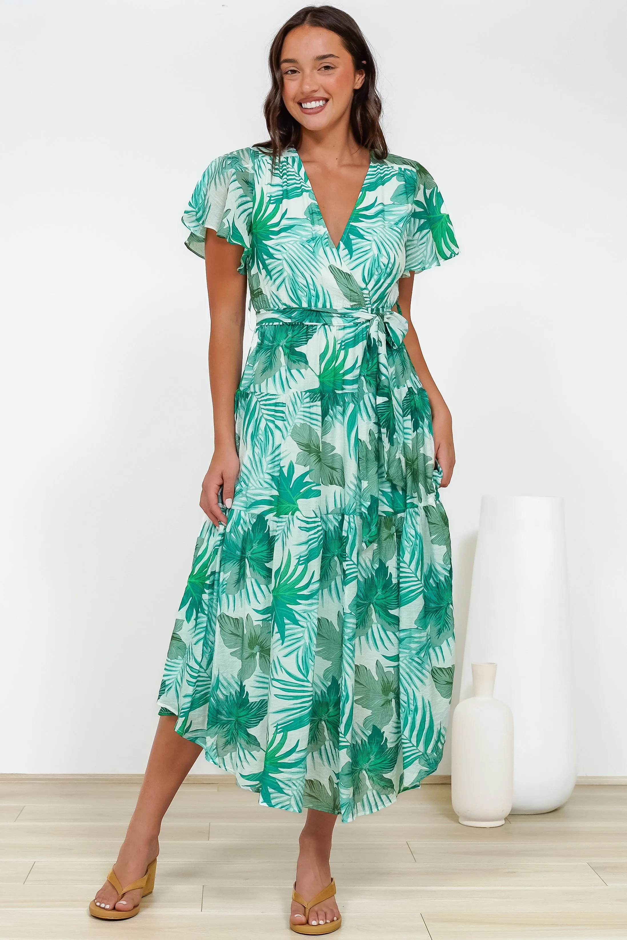 Delton Midi Dress in Rianne Print Green sold by Salty Crush
