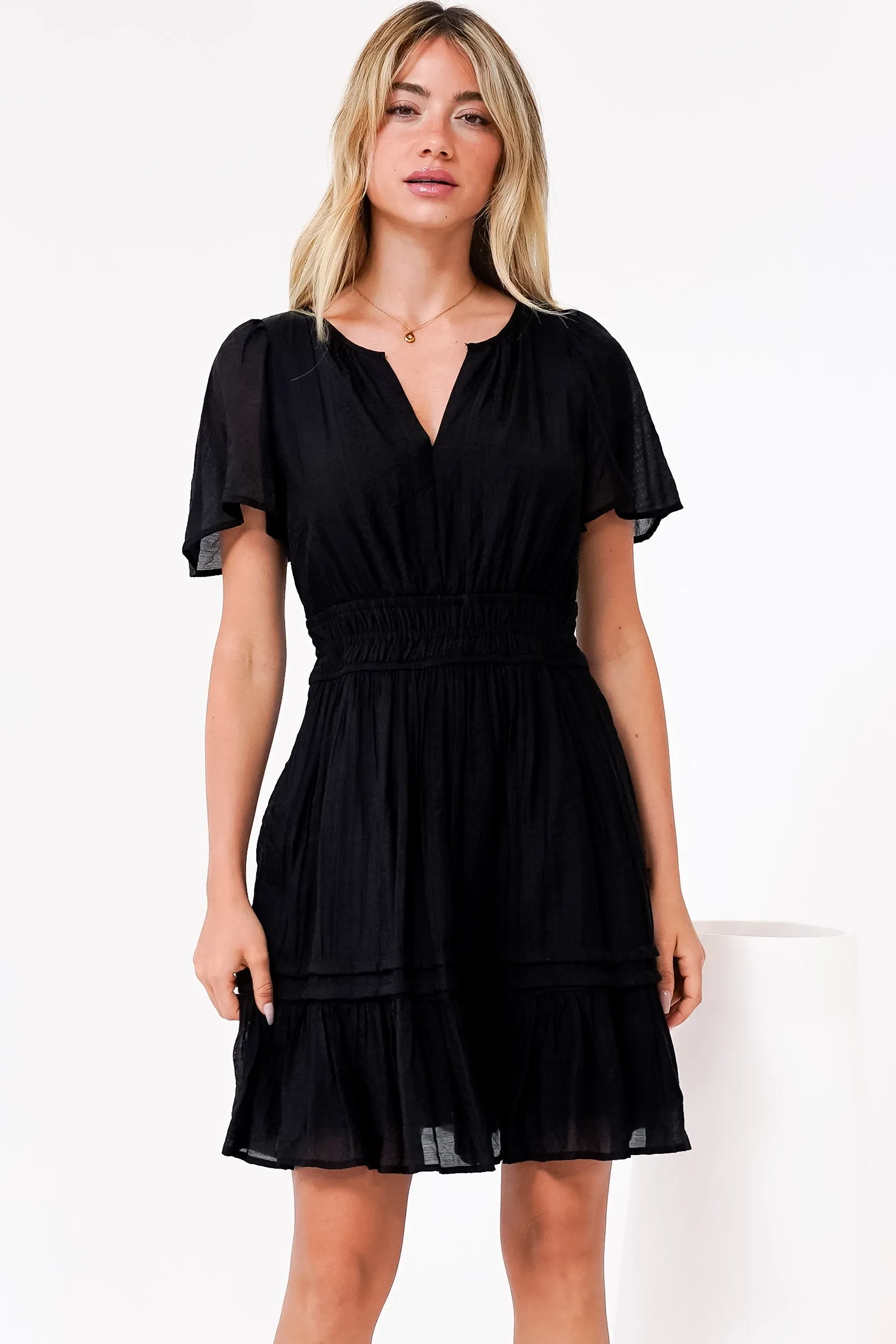 Payton Mini Dress - Pleat Detailed A-Line Dress with Cap Flutter Sleeves in Black sold by Salty Crush product image thumbnail 5