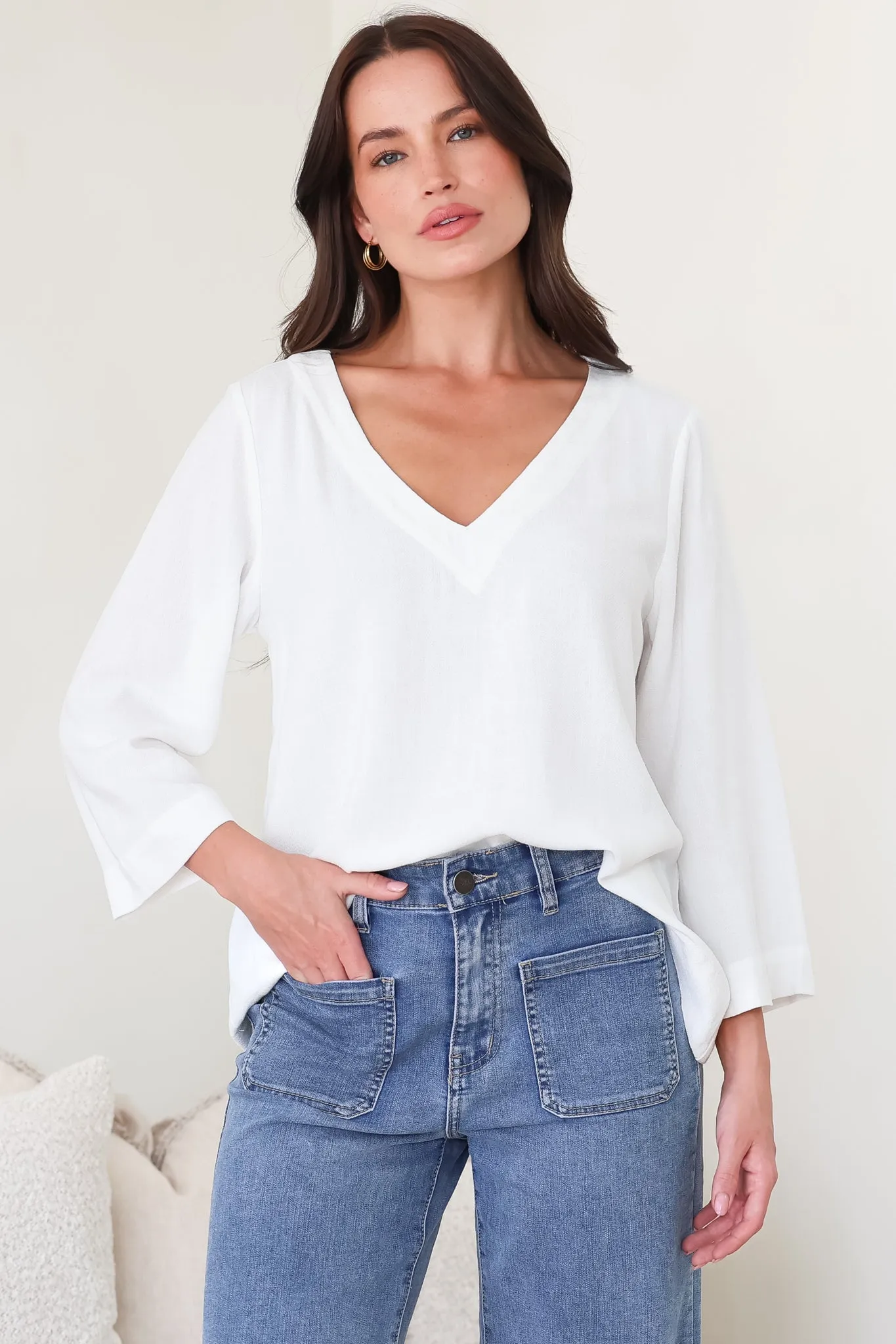 Breezer Top - Long Sleeve V Neck Pull Over Top with High Low Hemline in White sold by Salty Crush