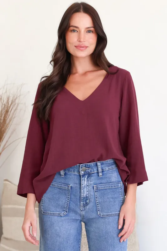 Breezer Top - Long Sleeve V Neck Pull Over Top with High Low Hemline in Wine made by Salty Crush