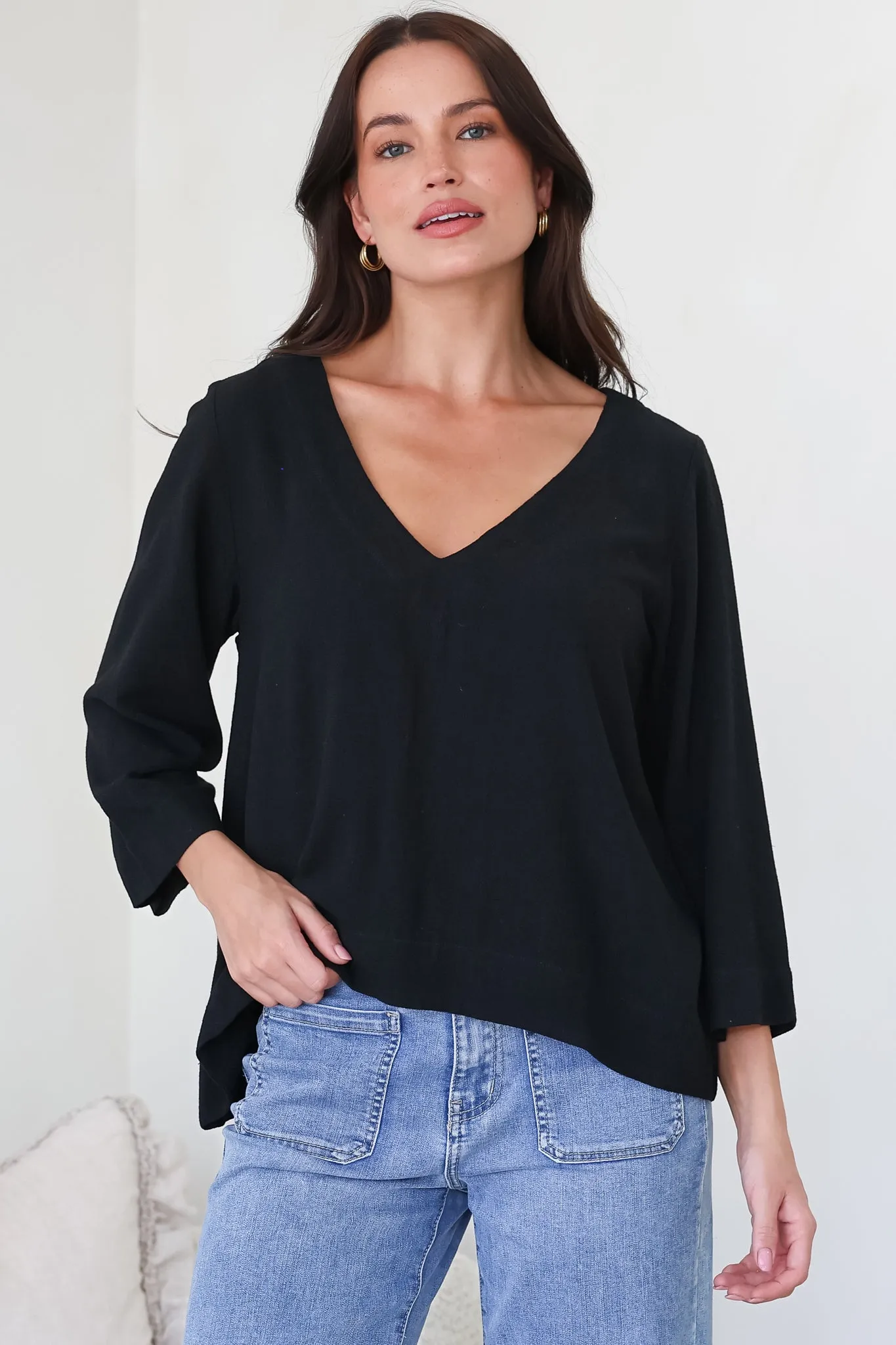 Breezer Top - Long Sleeve V Neck Pull Over Top with High Low Hemline in Black sold by Salty Crush