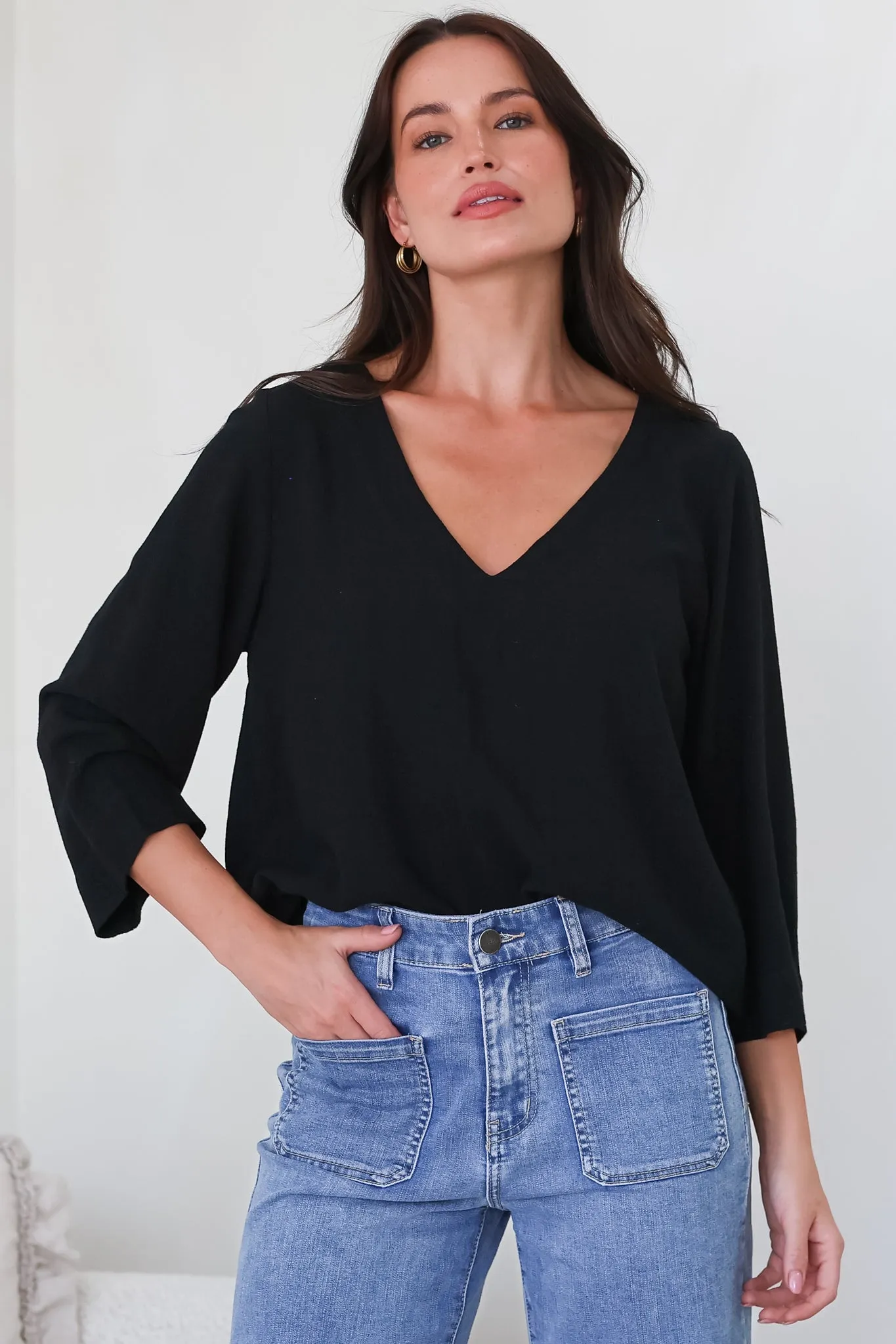 Breezer Top - Long Sleeve V Neck Pull Over Top with High Low Hemline in Black sold by Salty Crush product image thumbnail 4