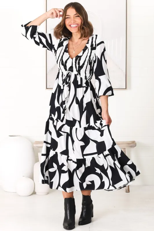 Elias Midi Dress - Shirred Elasticated Bodice A Line Dress with Long Sleeves in Azira Black sold by Salty Crush
