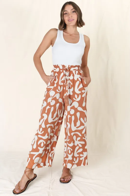 Jaxie Pants - Elasticated Paperpag Waist with Drawstring Wide Leg Pants with Pockets in Rust sold by Salty Crush